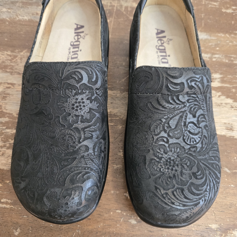 ALEGRIA Black Embossed Slip-On Shoes - Picture 2 of 10